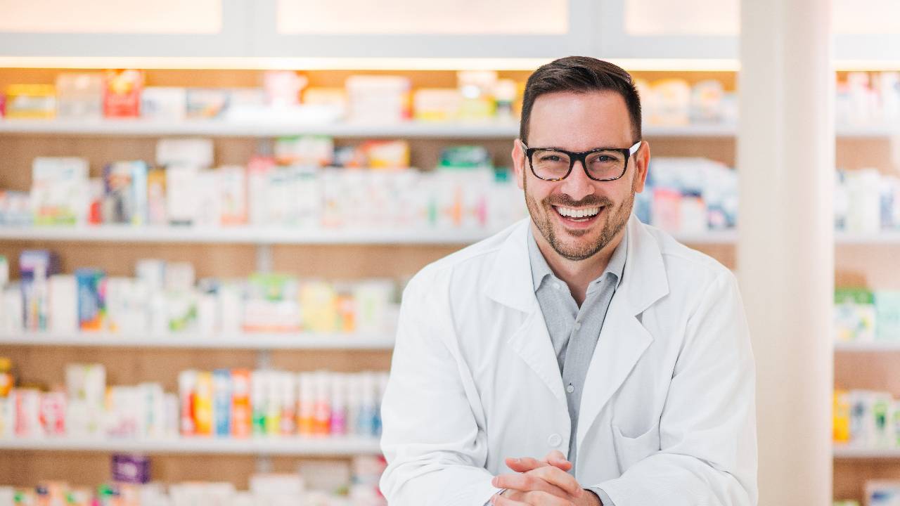 Portrait of cheerful male pharmacist
